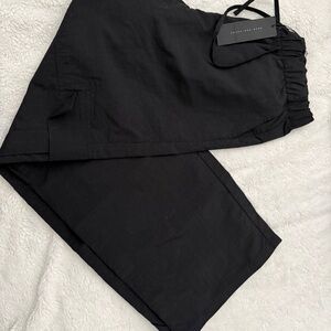 Womens Know One Cares Baggy Black Pants